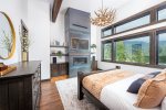 The master suite is a luxurious space to relax in - take in the mountain views as you enjoy your private fireplace.